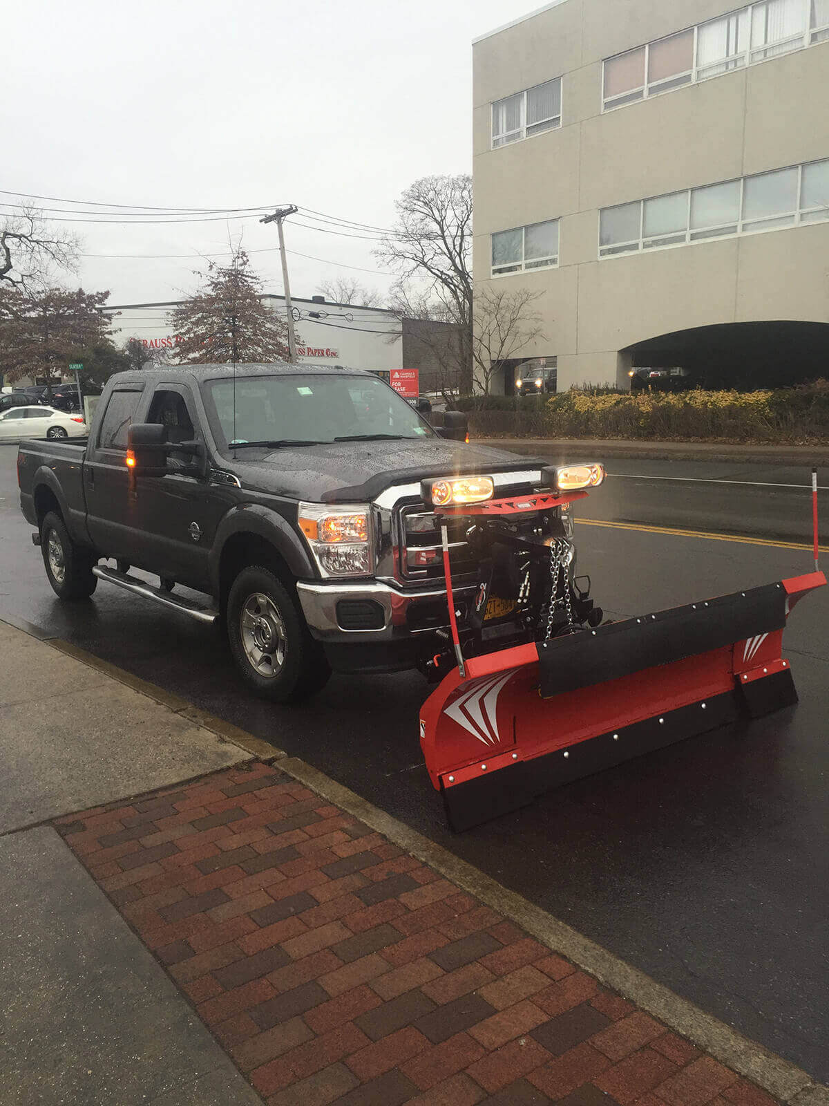 b&s snow plow truck - commercial property snow plowing services locust valley ny