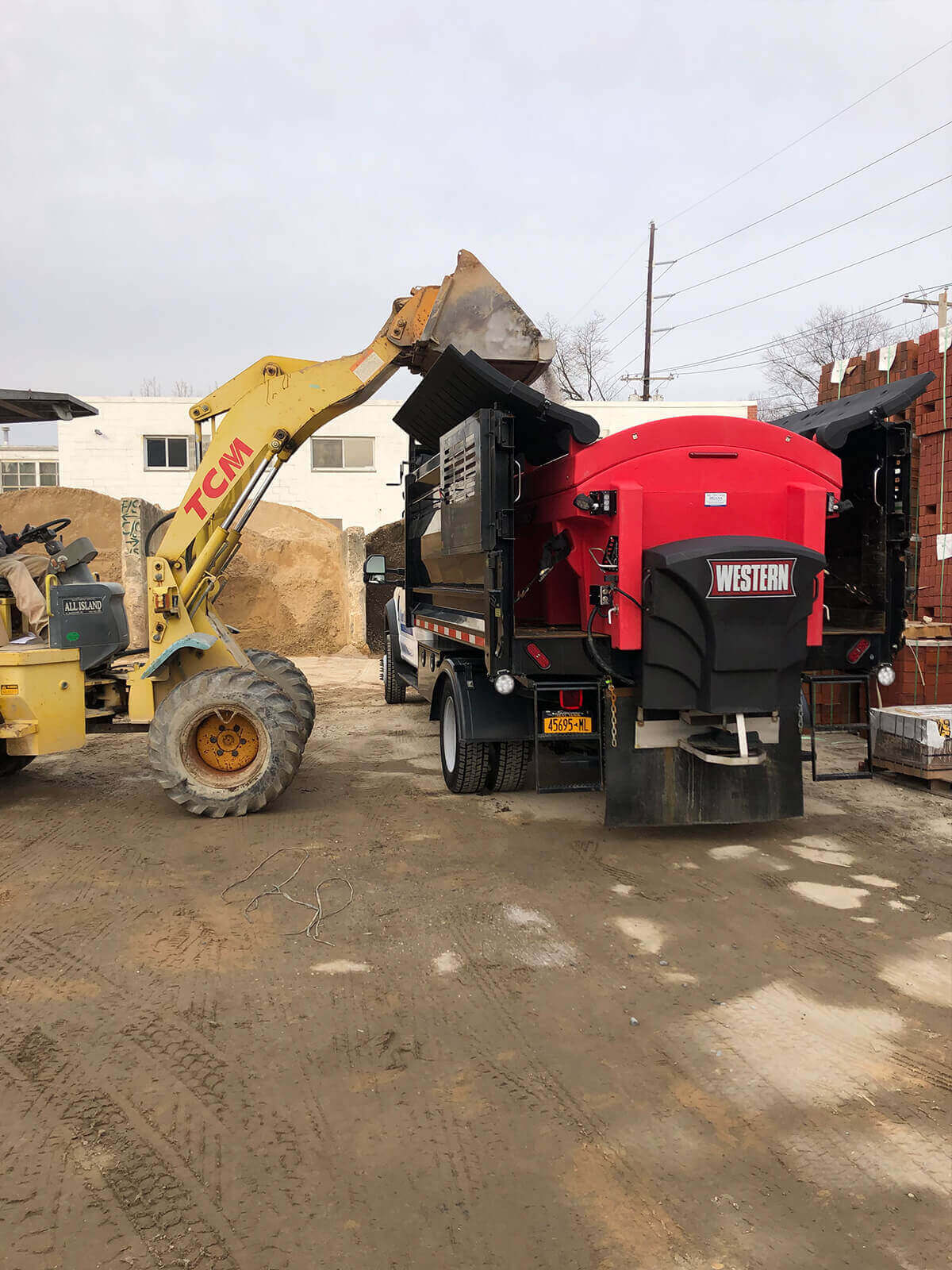 b&s sanding truck and loader  - commercial property snow plowing services locust valley ny